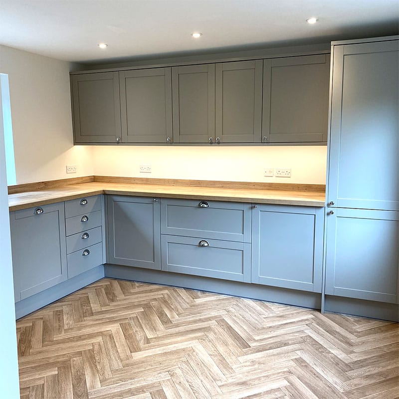 Grey shaker kitchen with oak worktops