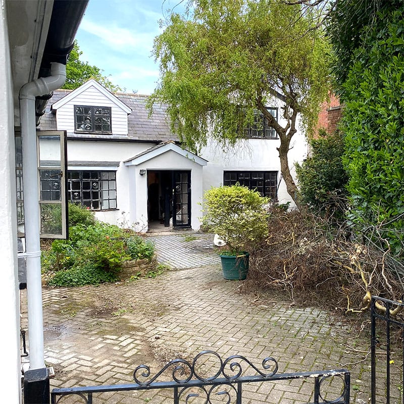 Cottage exterior before landscaping